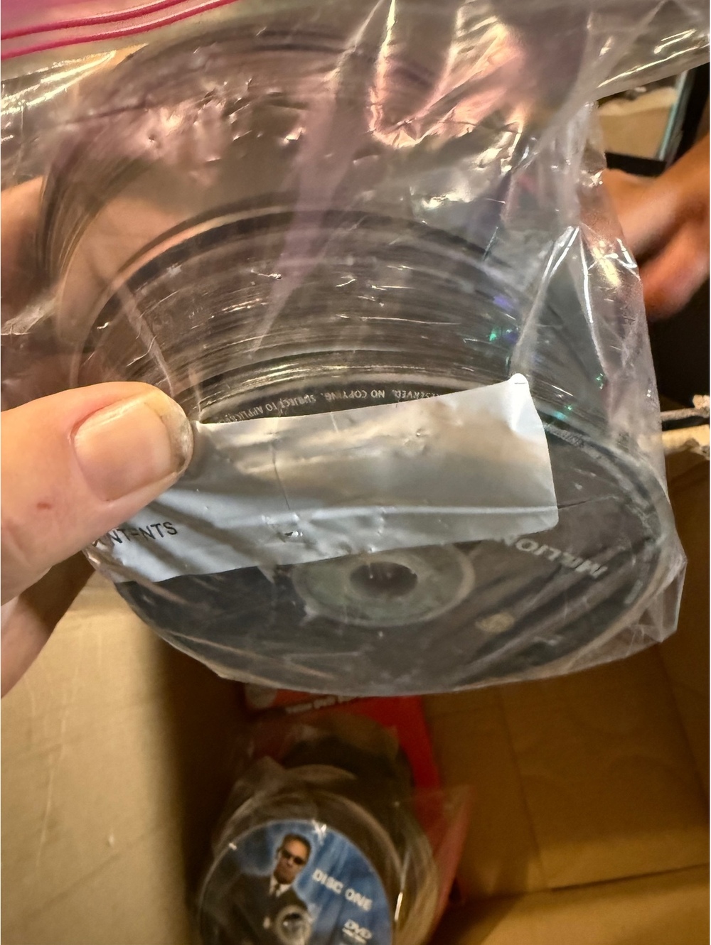 Mix of loose DVDs and video games random amount